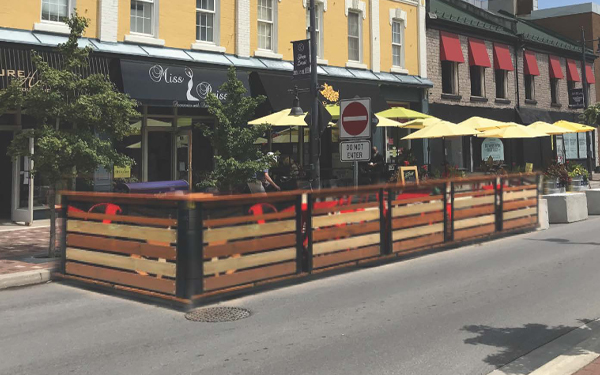Mockup of a pop up patio on a street.